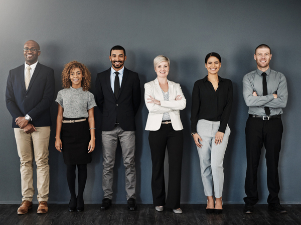 A group of people standing side by side